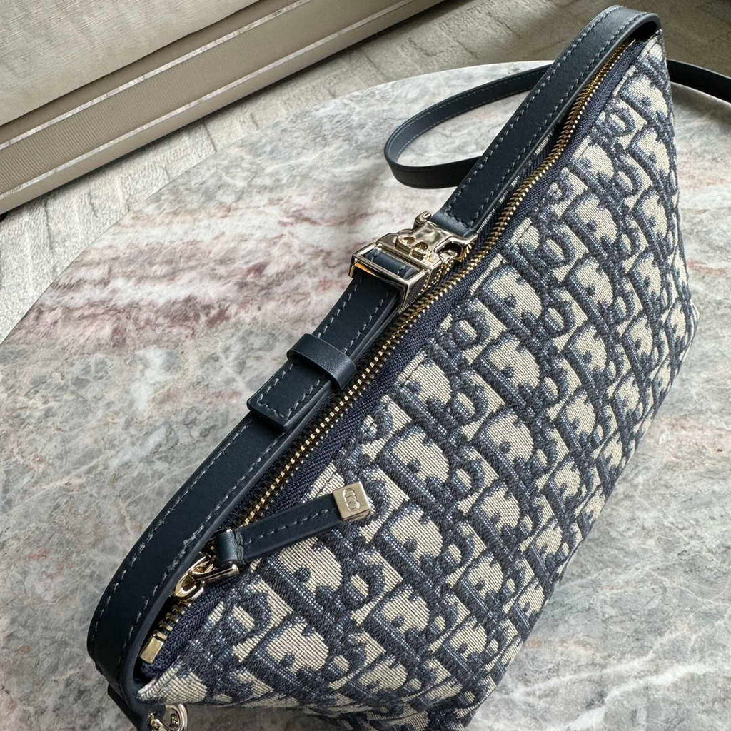 Dior S5554 Medium DiorTravel Nomad Pouch Blue Dior Oblique Jacquard