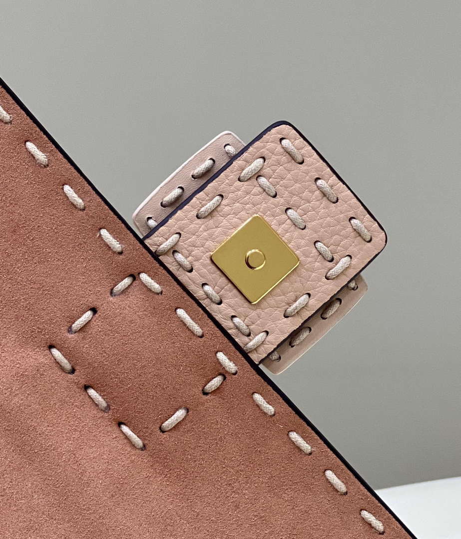 Fendi 8BR600 Baguette Medium Re-Edition bag in Pink lam¨¦ sheepskin