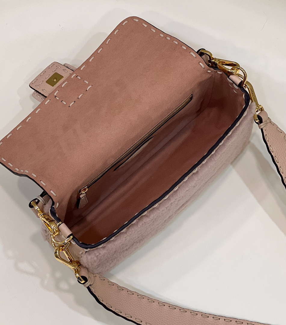 Fendi 8BR600 Baguette Medium Re-Edition bag in Pink lam¨¦ sheepskin