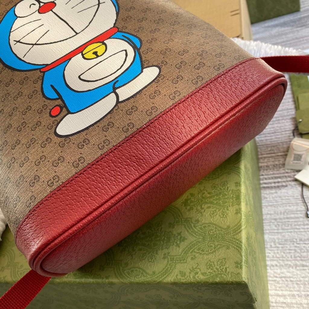 Gucci 647816 Doraemon x Gucci small backpack in mini GG canvas