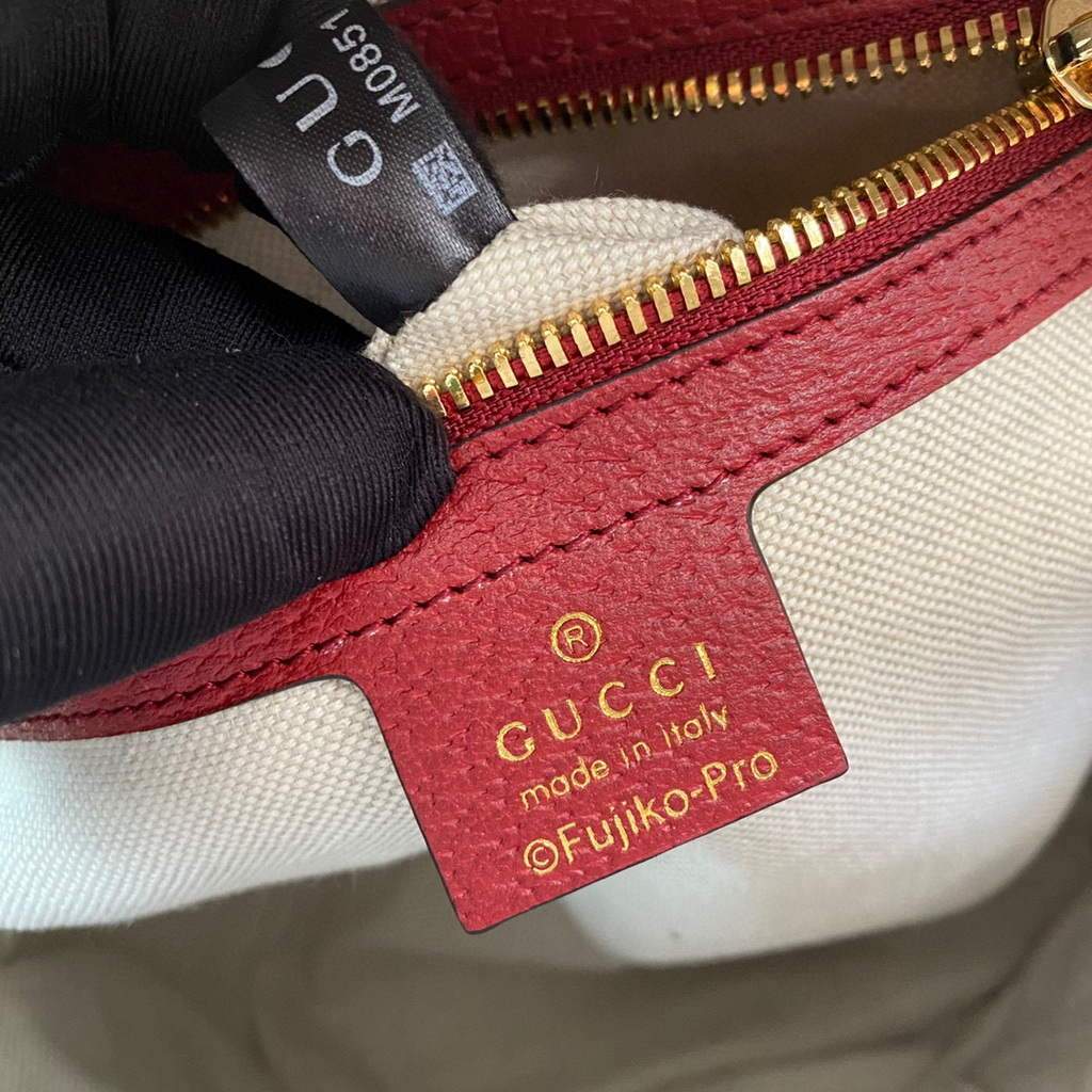 Gucci 647816 Doraemon x Gucci small backpack in mini GG canvas