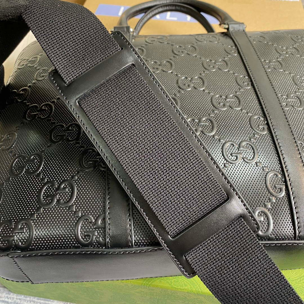 Gucci 658573 Men's GG embossed briefcase Bag Black