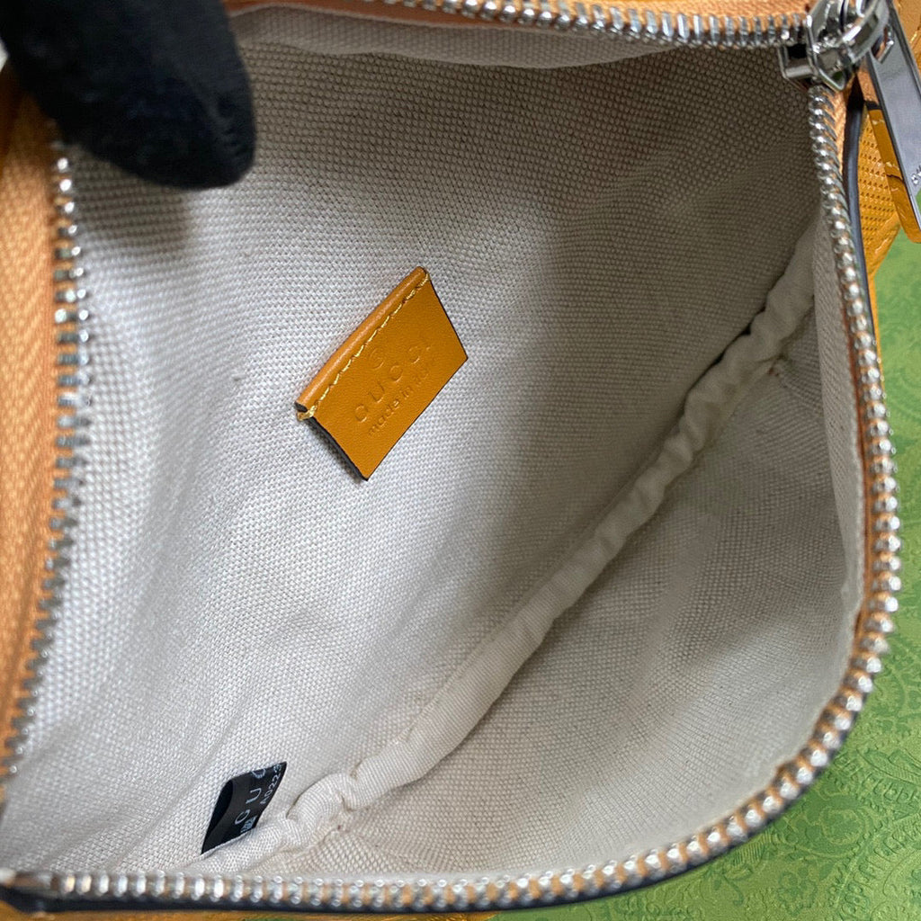 Gucci 658582 GG embossed belt bag Yellow GG embossed leather