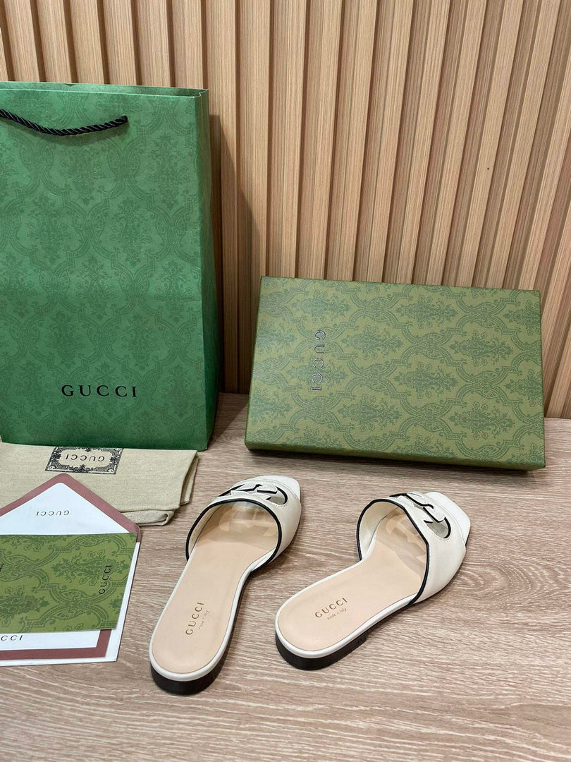 Gucci 694451 Women's Interlocking G cut-out slide sandal G66754