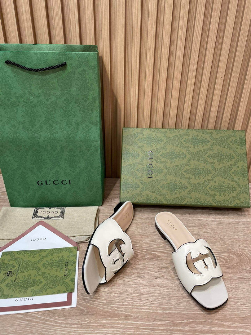 Gucci 694451 Women's Interlocking G cut-out slide sandal G66754