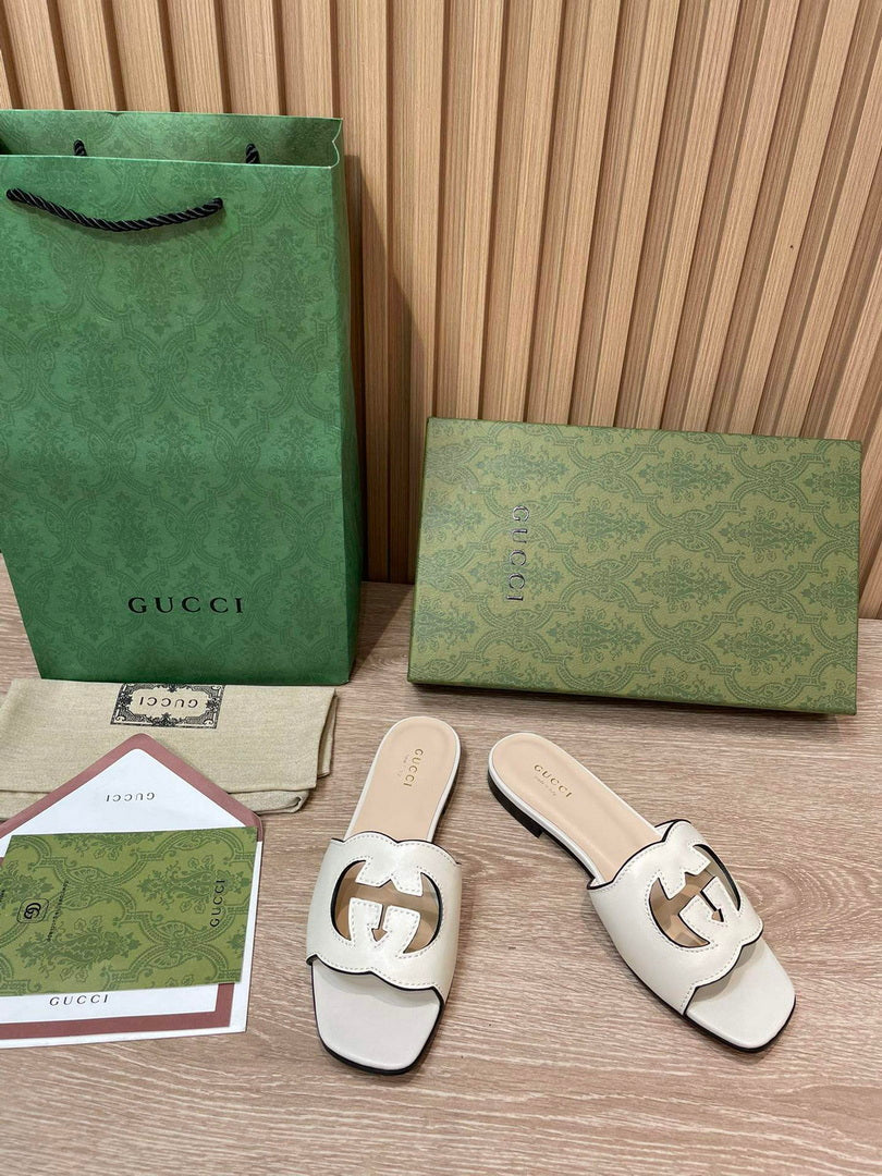 Gucci 694451 Women's Interlocking G cut-out slide sandal G66754