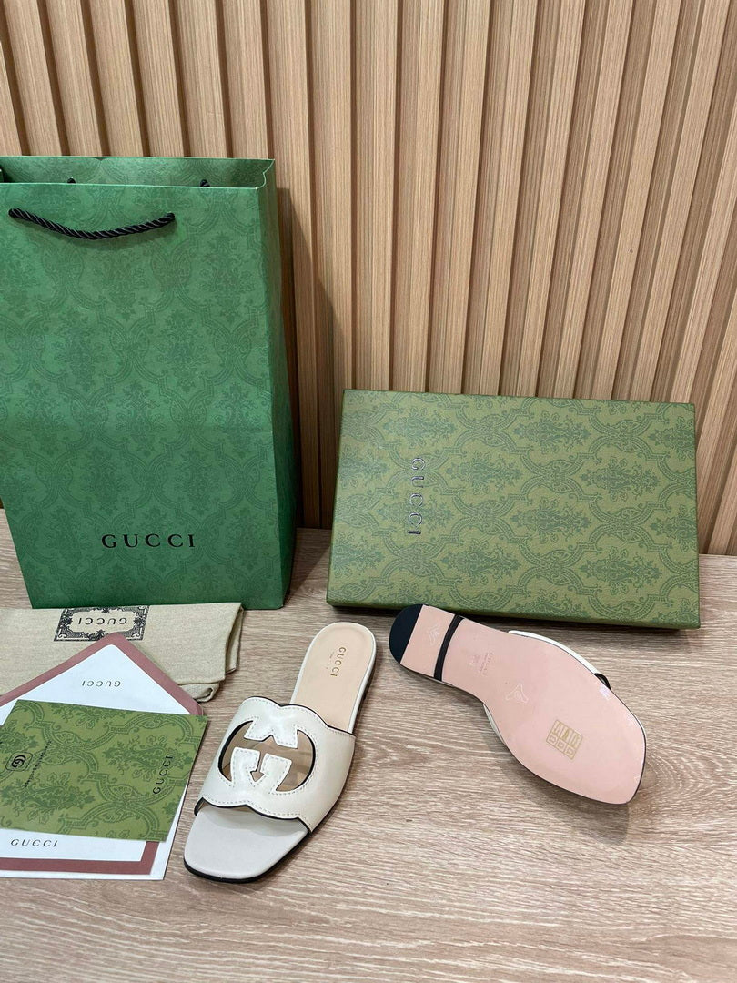 Gucci 694451 Women's Interlocking G cut-out slide sandal G66754