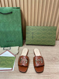 Gucci 694451 Women's Interlocking G cut-out slide sandal G66756