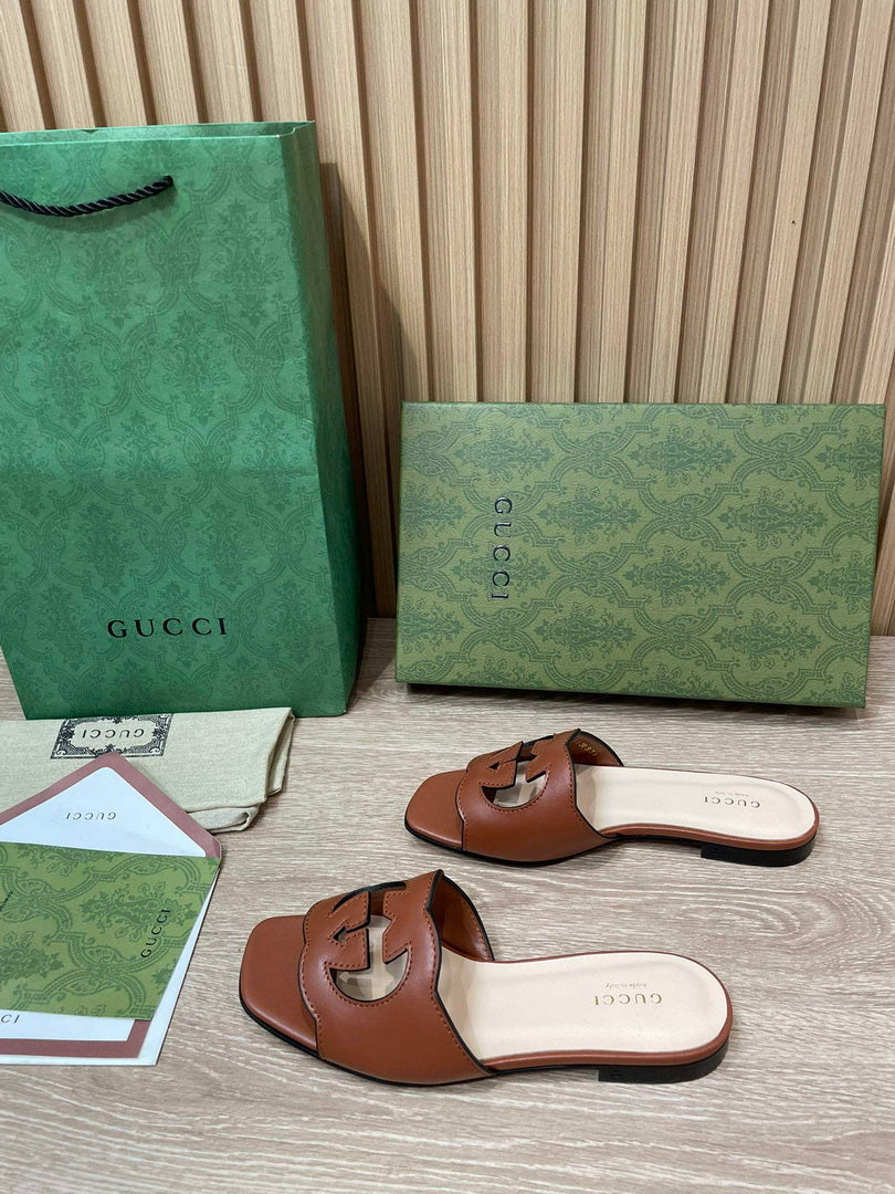 Gucci 694451 Women's Interlocking G cut-out slide sandal G66756