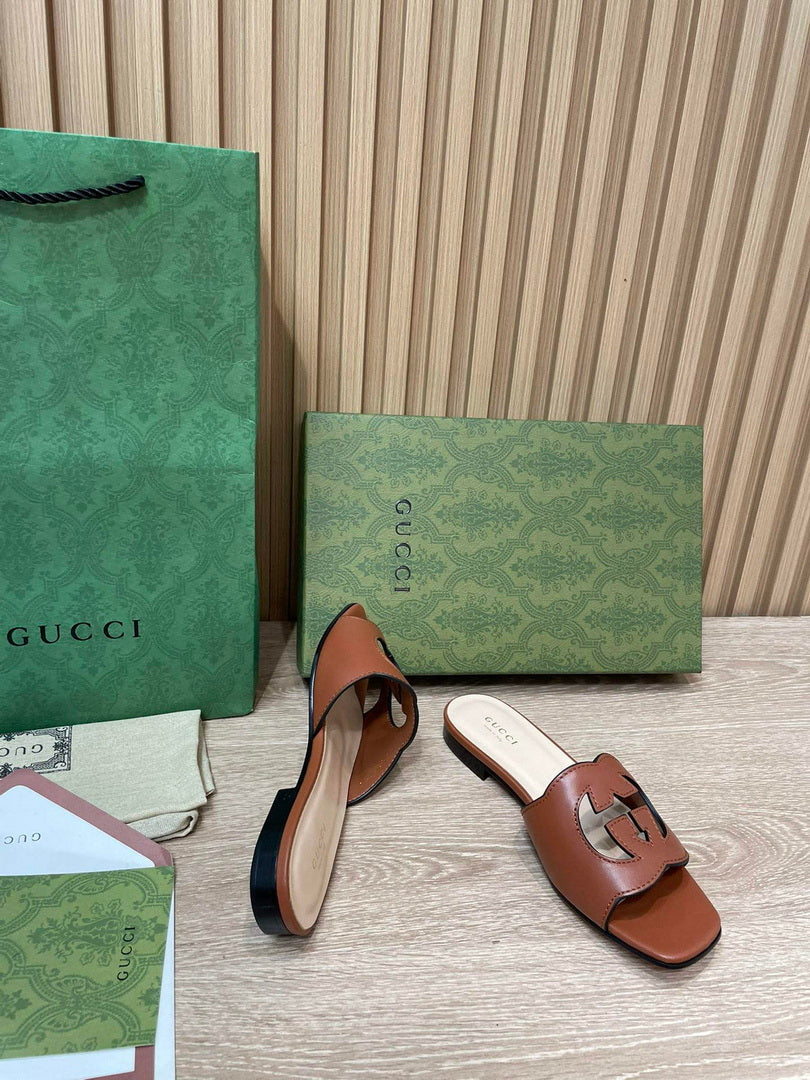 Gucci 694451 Women's Interlocking G cut-out slide sandal G66756