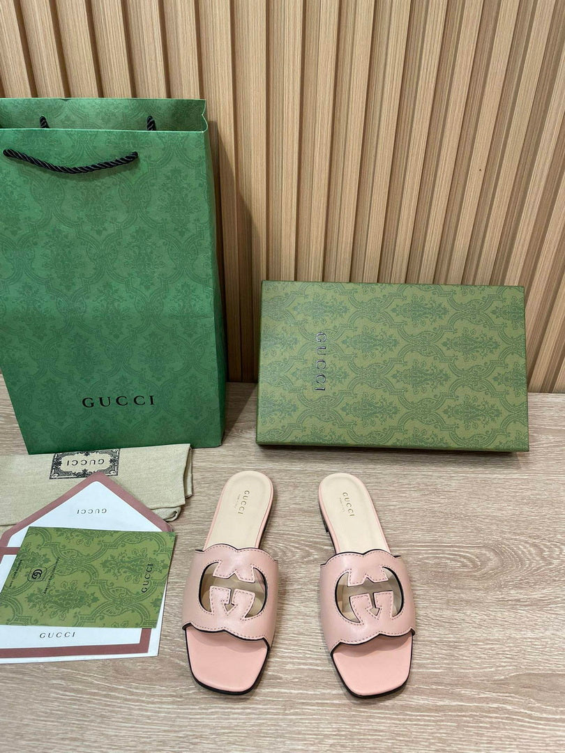 Gucci 694451 Women's Interlocking G cut-out slide sandal G66757