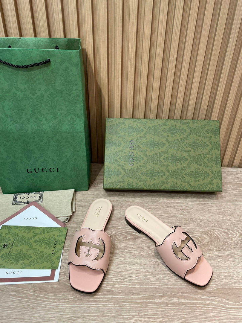 Gucci 694451 Women's Interlocking G cut-out slide sandal G66757