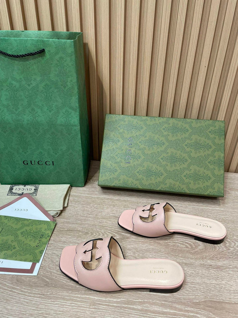 Gucci 694451 Women's Interlocking G cut-out slide sandal G66757