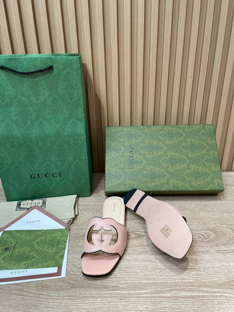 Gucci 694451 Women's Interlocking G cut-out slide sandal G66757