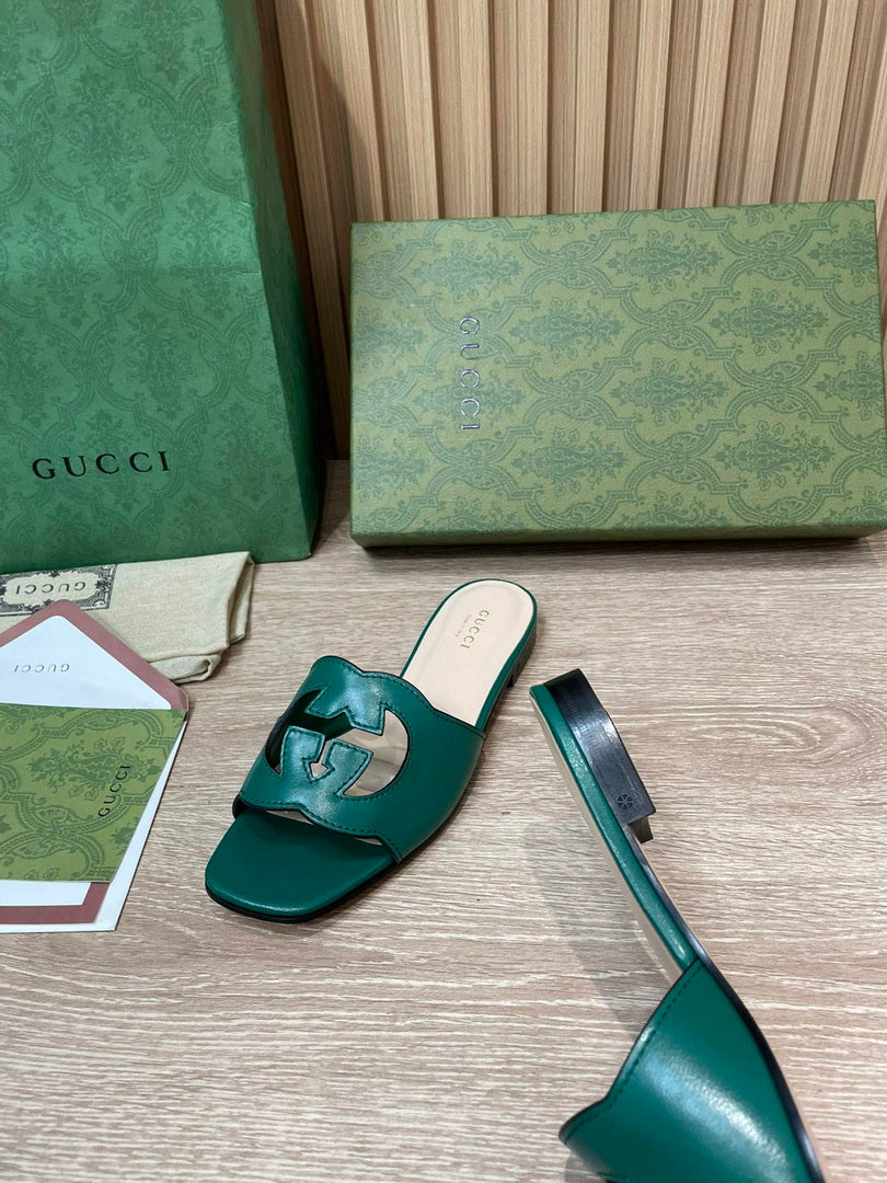 Gucci 694451 Women's Interlocking G cut-out slide sandal G66758