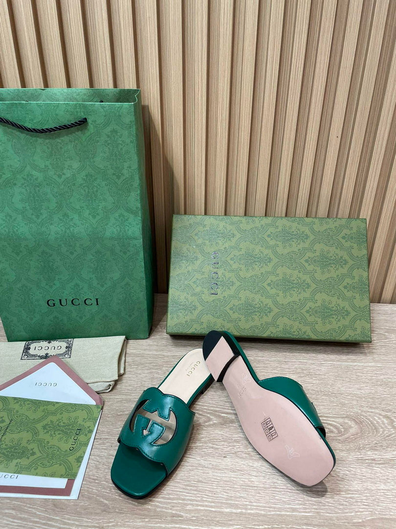 Gucci 694451 Women's Interlocking G cut-out slide sandal G66758