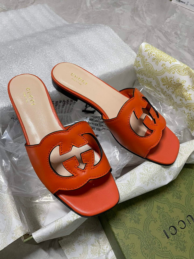 Gucci 694451 Women's Interlocking G cut-out slide sandal G66759