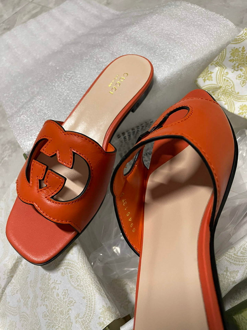 Gucci 694451 Women's Interlocking G cut-out slide sandal G66759