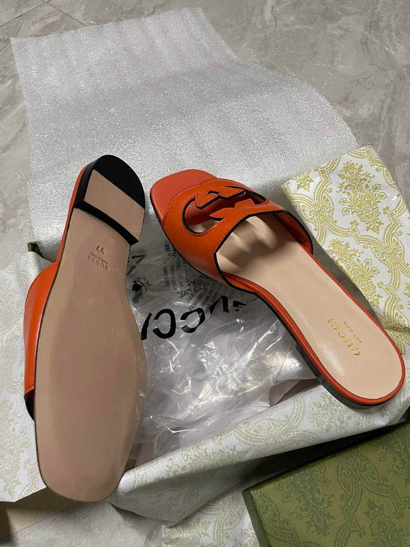 Gucci 694451 Women's Interlocking G cut-out slide sandal G66759