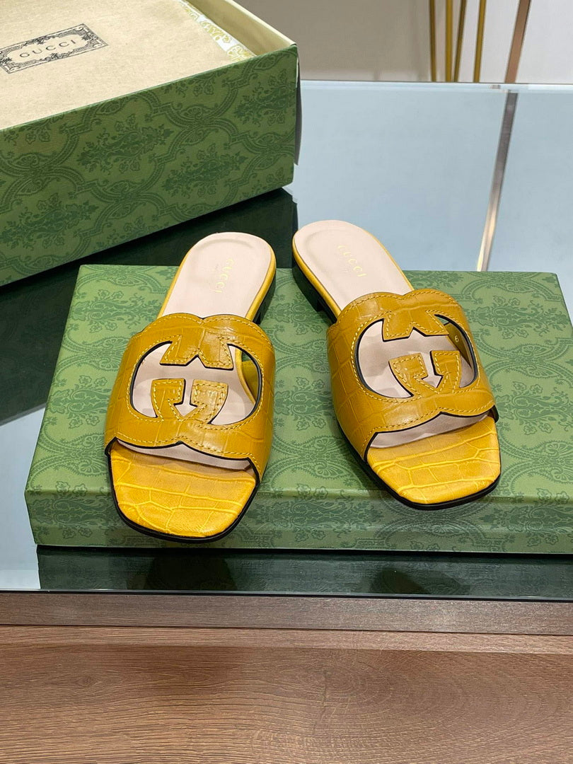 Gucci 694451 Women's Interlocking G cut-out slide sandal G66760