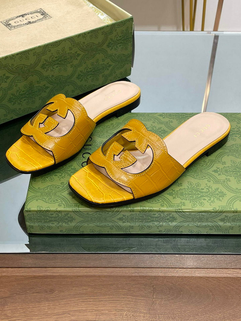 Gucci 694451 Women's Interlocking G cut-out slide sandal G66760