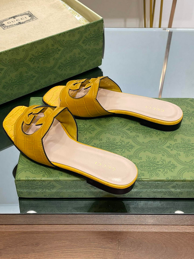 Gucci 694451 Women's Interlocking G cut-out slide sandal G66760