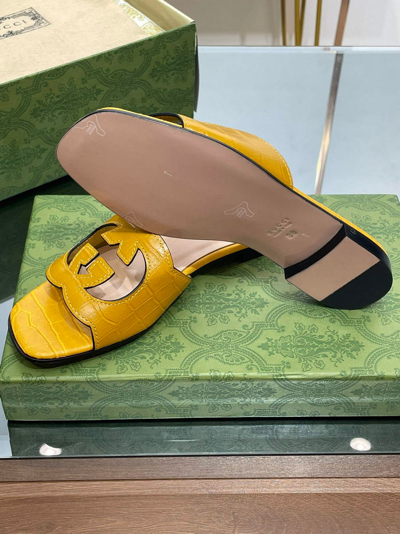 Gucci 694451 Women's Interlocking G cut-out slide sandal G66760