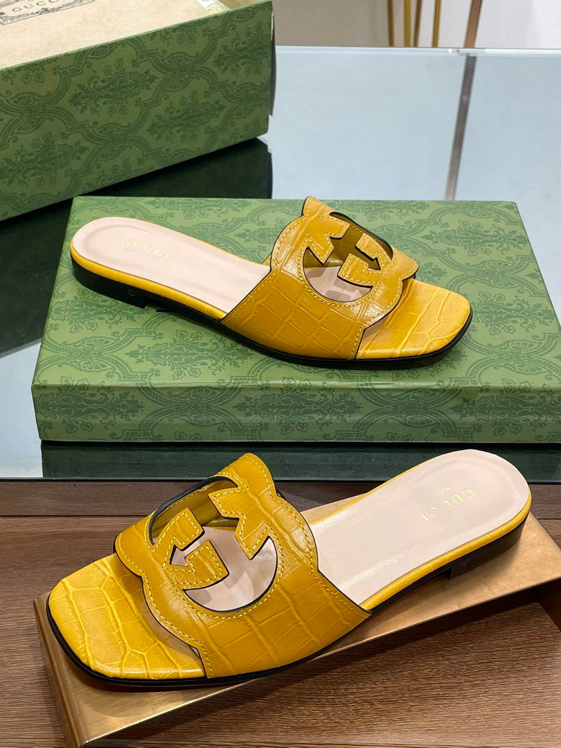 Gucci 694451 Women's Interlocking G cut-out slide sandal G66760