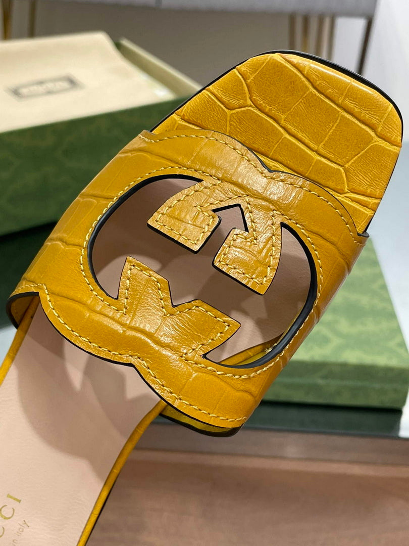 Gucci 694451 Women's Interlocking G cut-out slide sandal G66760