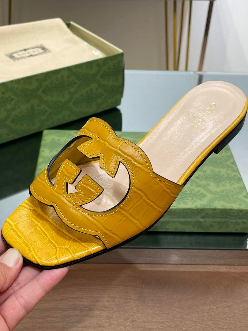 Gucci 694451 Women's Interlocking G cut-out slide sandal G66760