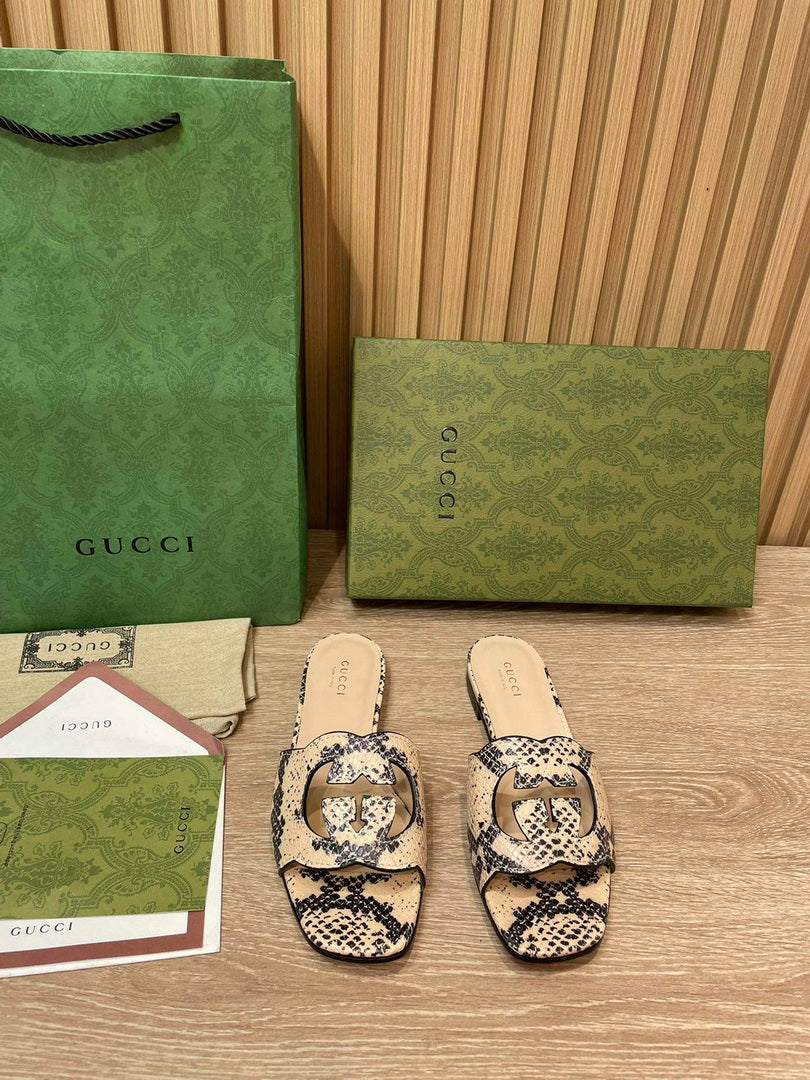 Gucci 694451 Women's Interlocking G cut-out slide sandal G66762
