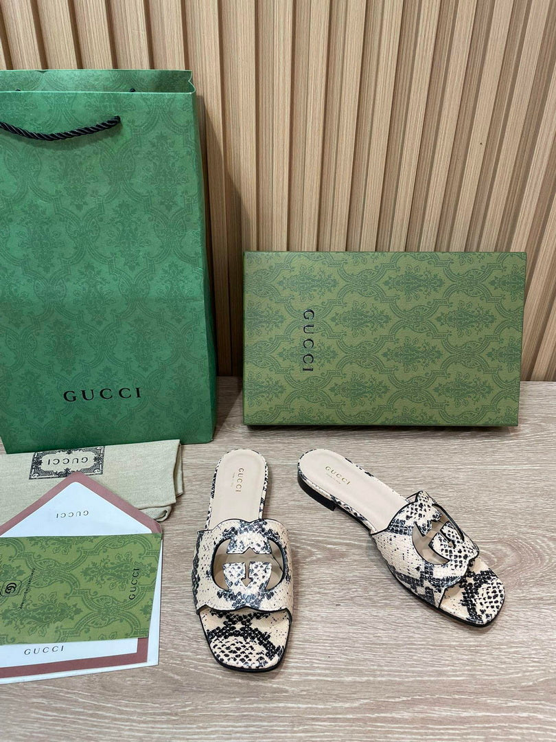 Gucci 694451 Women's Interlocking G cut-out slide sandal G66762