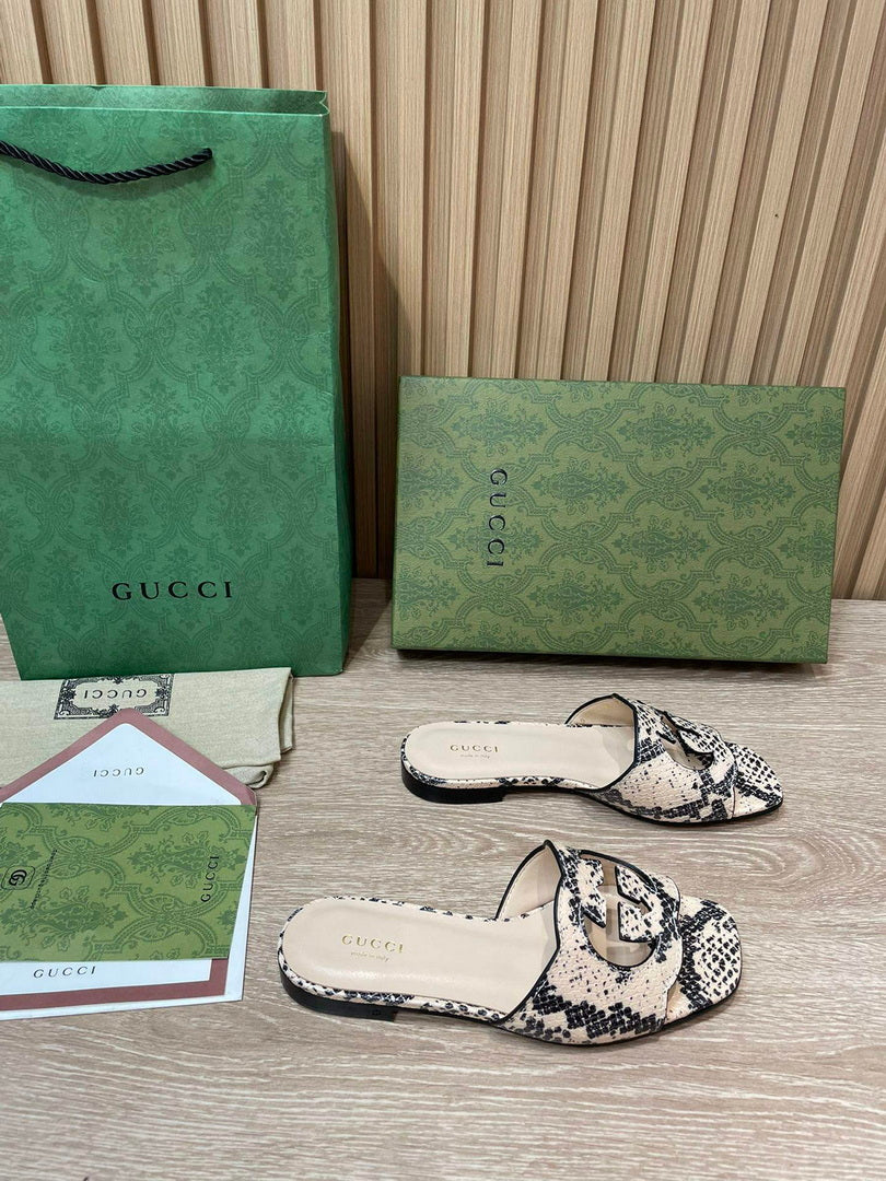 Gucci 694451 Women's Interlocking G cut-out slide sandal G66762