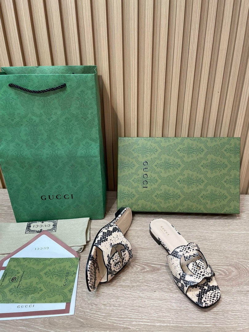 Gucci 694451 Women's Interlocking G cut-out slide sandal G66762