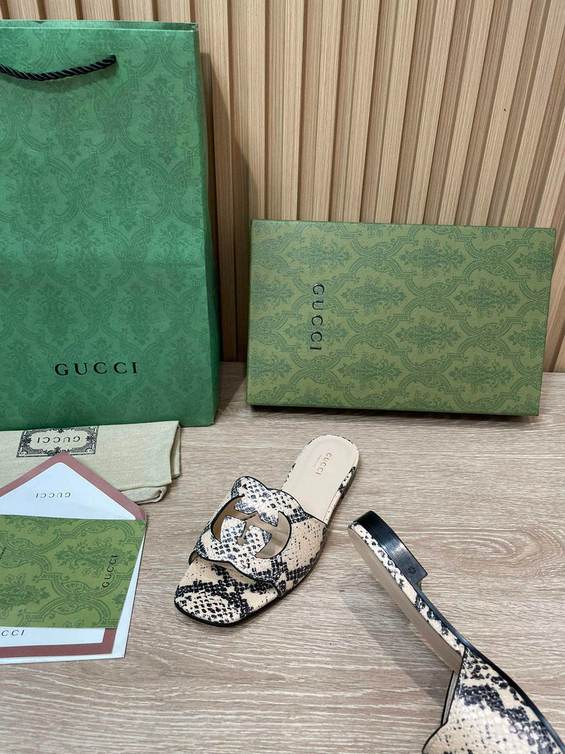 Gucci 694451 Women's Interlocking G cut-out slide sandal G66762