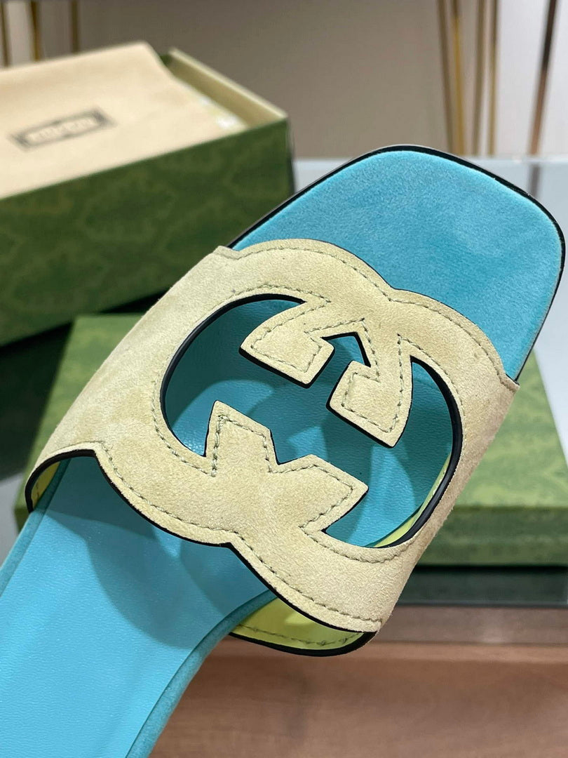Gucci 694451 Women's Interlocking G cut-out slide sandal G66765