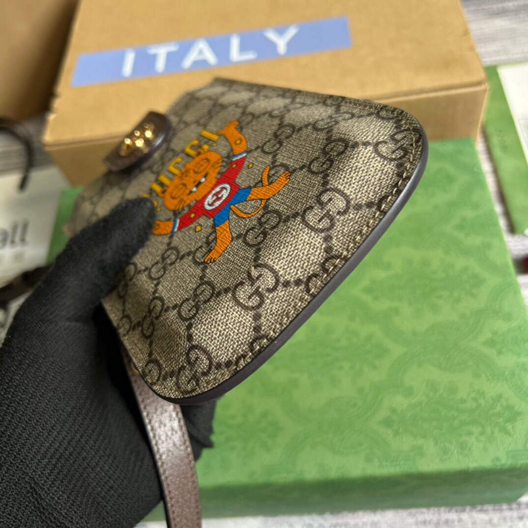 Gucci 700732 Gucci cat print phone case Brown