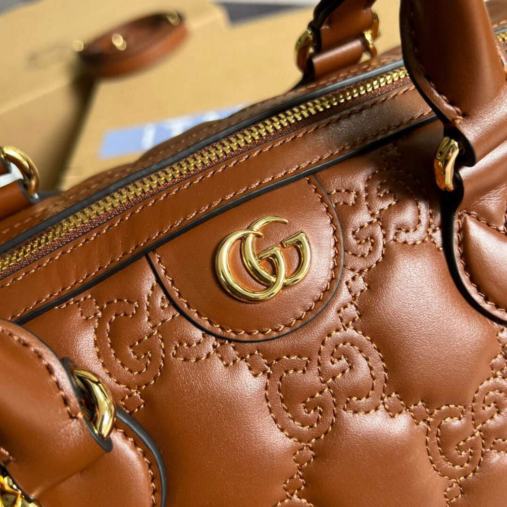 Gucci 702242 GG matelass¨¦ leather shoulder bag Brown