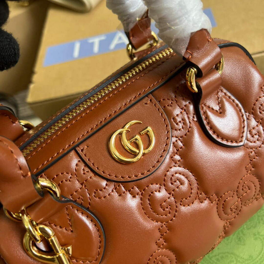Gucci 702251 GG matelass¨¦ leather top handle bag Brown
