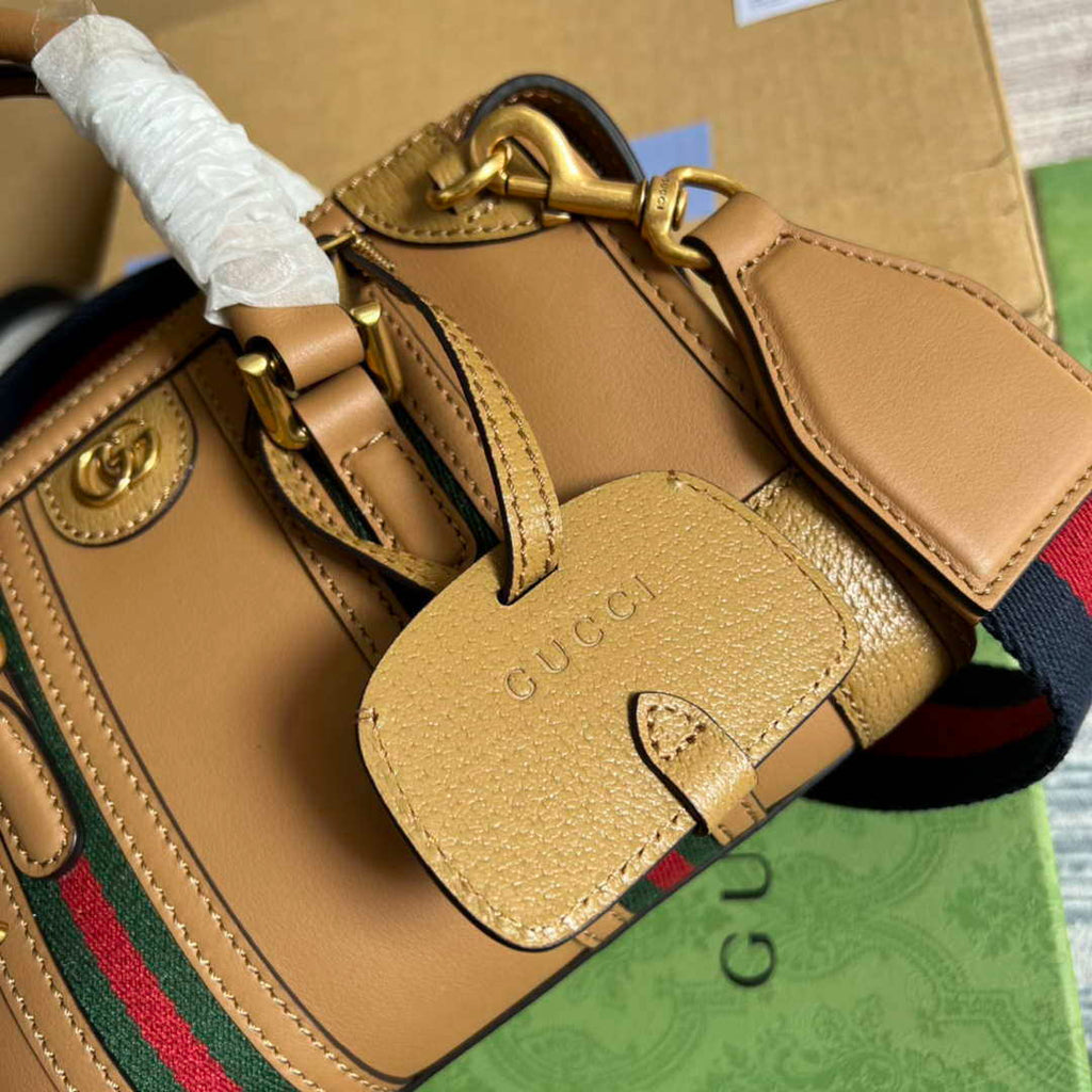 Gucci 715771 Mini top handle bag with Double G Tan