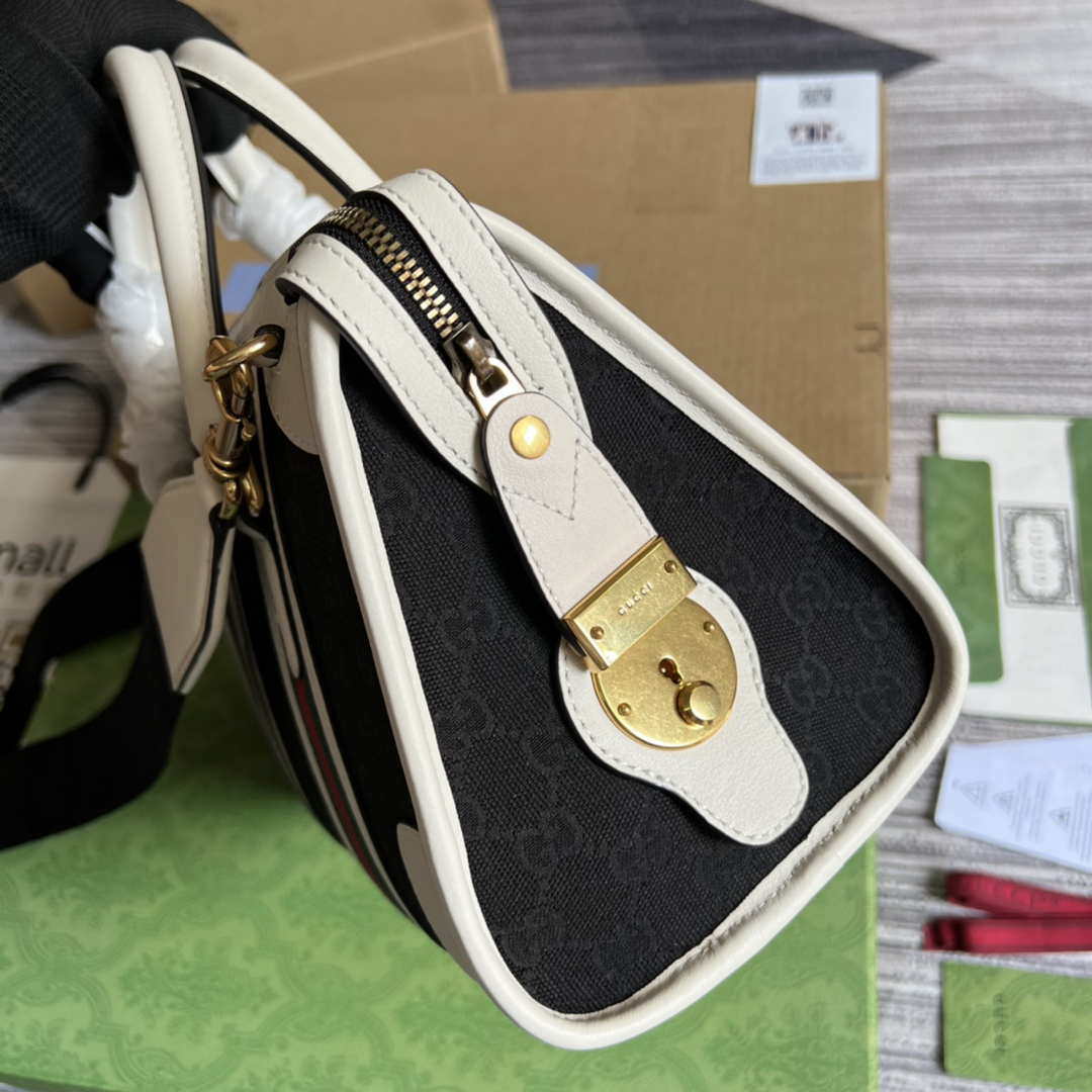 Gucci 715772 Small canvas top handle bag White and Black