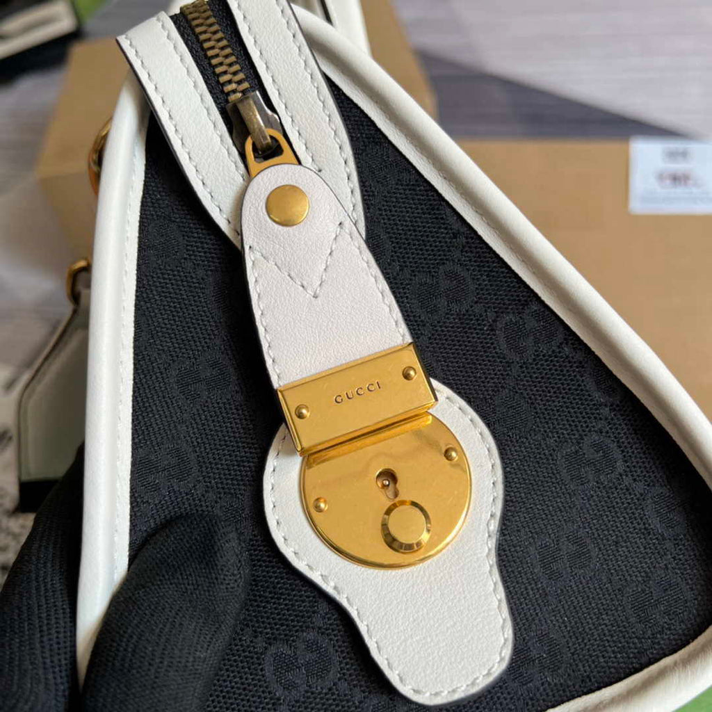 Gucci 715772 Small canvas top handle bag White and Black