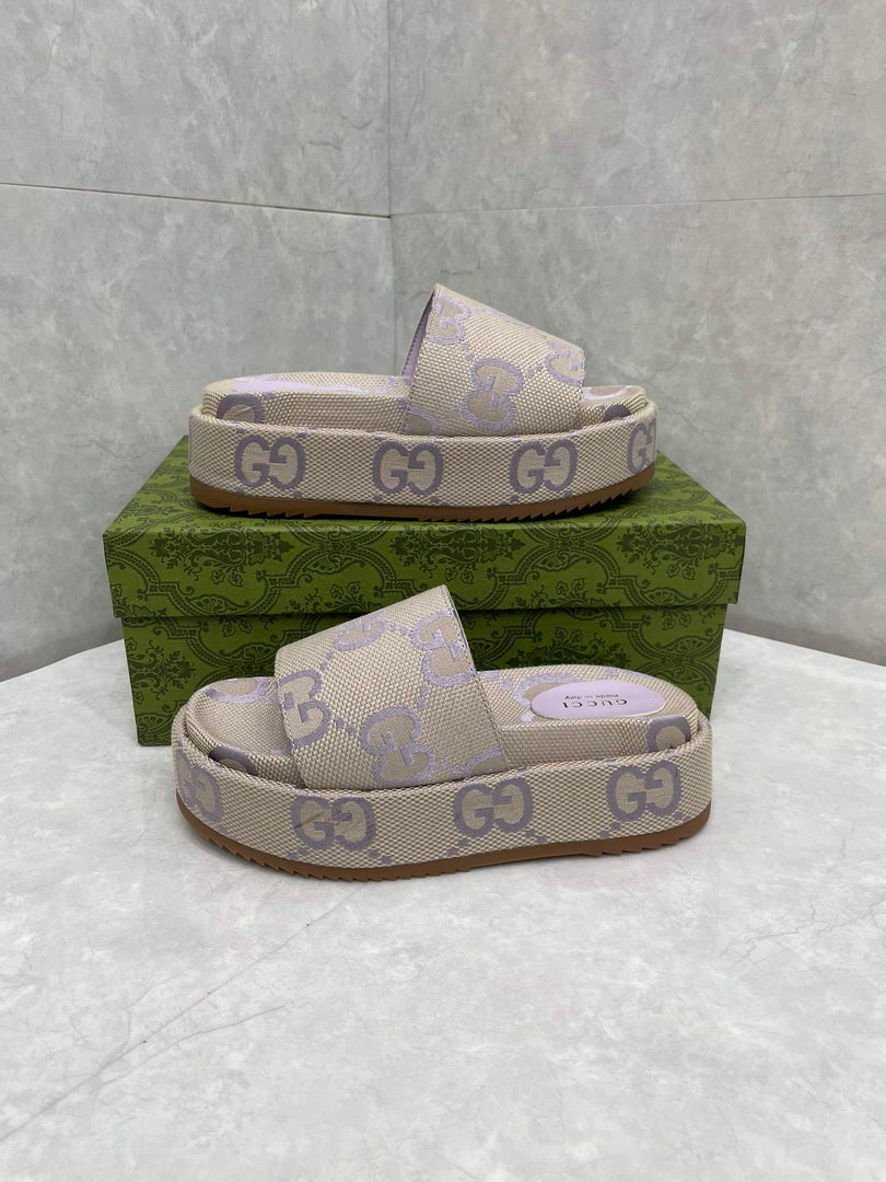 Gucci 730043 Women's jumbo GG platform slide sandal G82367