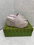 Gucci 730047 Women's jumbo GG platform slide sandal G82363