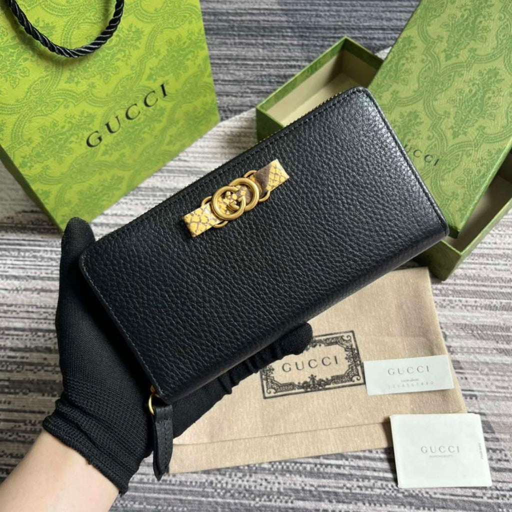 Gucci 750458 Zip wallet with Interlocking G python bow Black