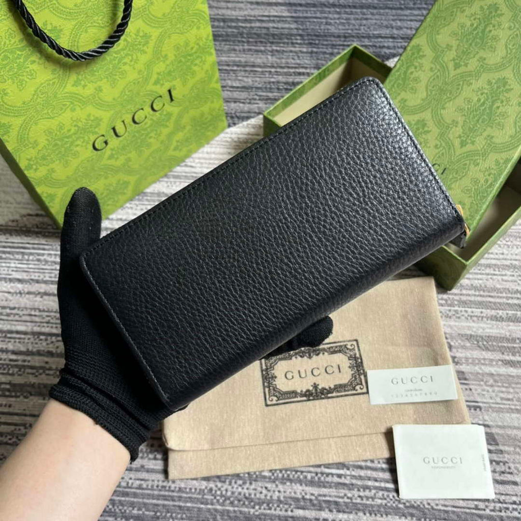 Gucci 750458 Zip wallet with Interlocking G python bow Black