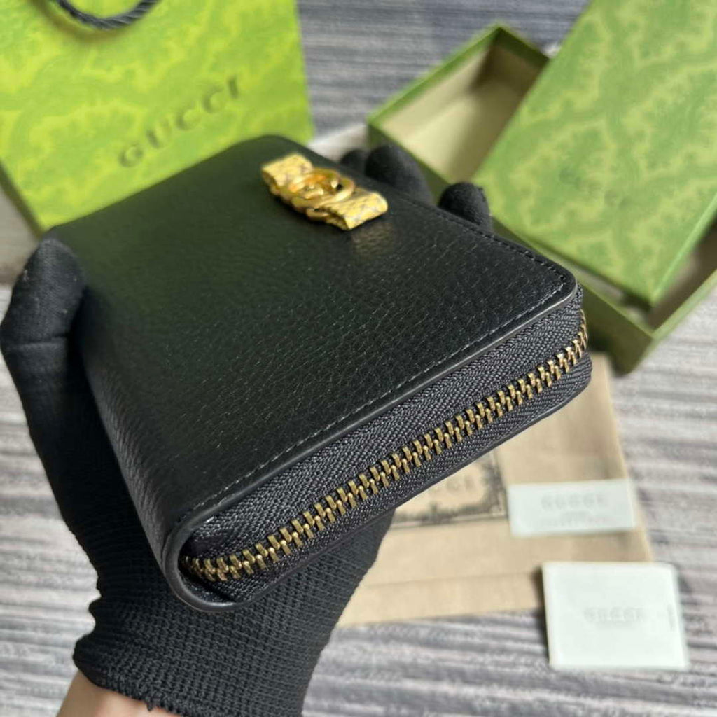Gucci 750458 Zip wallet with Interlocking G python bow Black