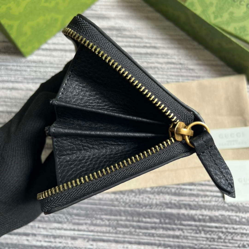 Gucci 750458 Zip wallet with Interlocking G python bow Black