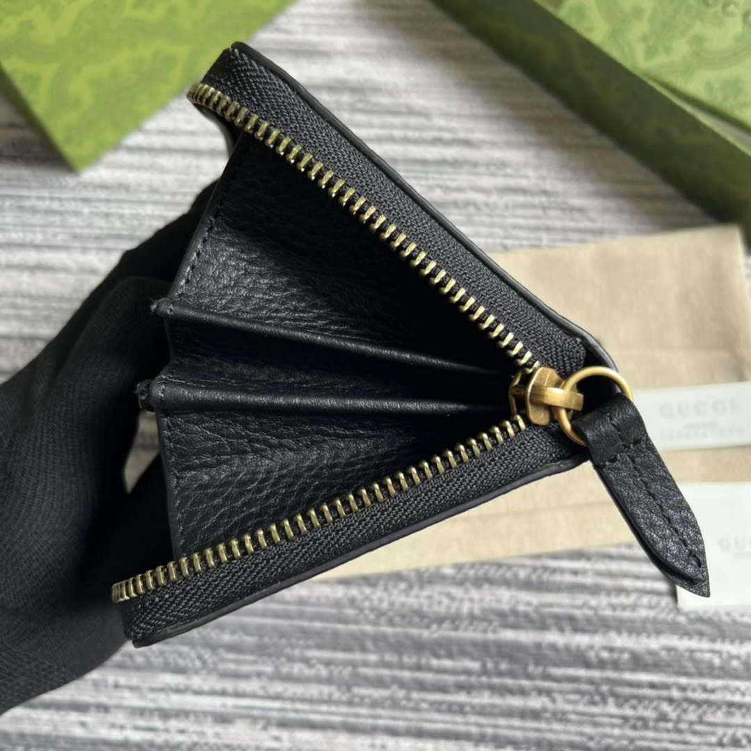 Gucci 750458 Zip wallet with Interlocking G python bow Black