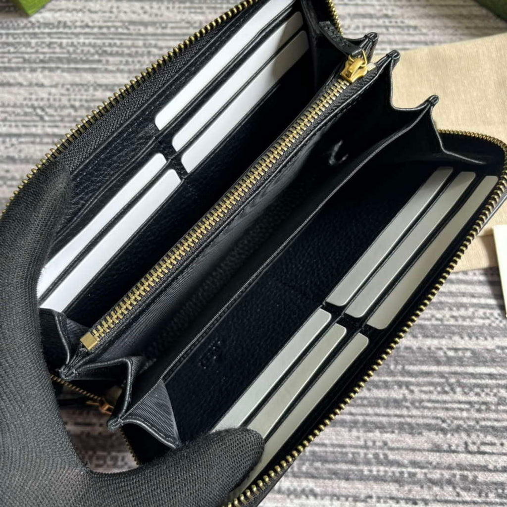 Gucci 750458 Zip wallet with Interlocking G python bow Black